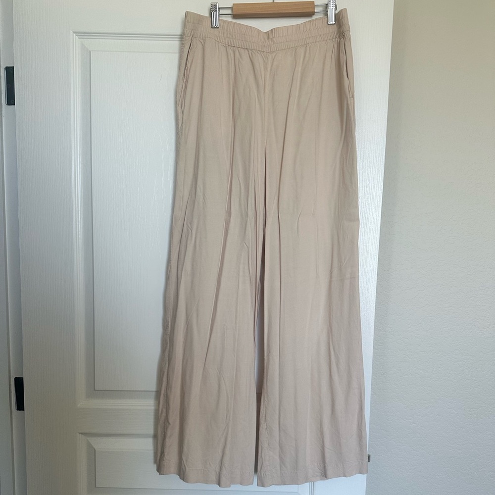 H&M 
Divided beige wide leg trousers 
Size 10